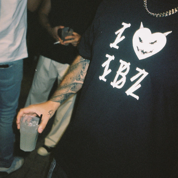 Close-up of a guest wearing a 44 Label Group T-shirt during the AW24 event at Eraldo Store Jesolo.
