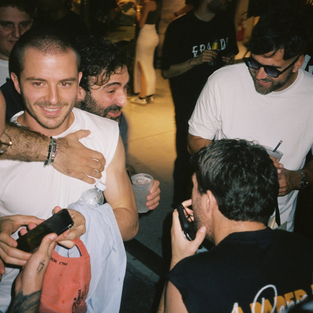 Guests laughing and enjoying themselves during the 44 Label Group AW24 event at Eraldo Store Jesolo.