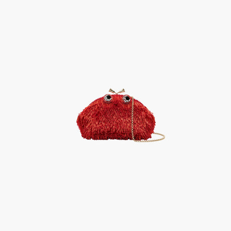 Red beaded crossbody bag with crystal embellishments and gold chain by Anya Hindmarch