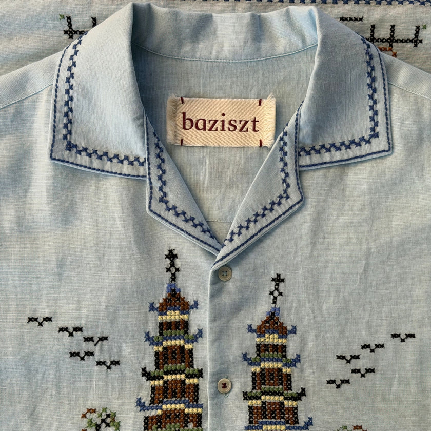 Light blue cotton shirt by Baziszt with blue and green embroidery details