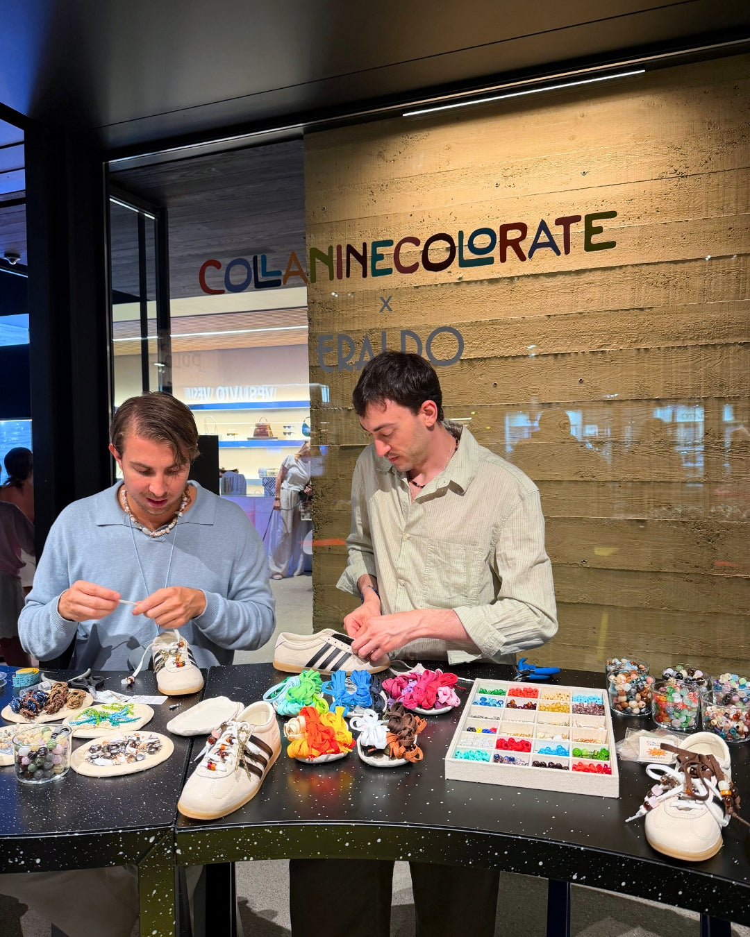Collanine Colorate team members customizing sneakers selected by Eraldo customers with colorful beads, charms and laces during the 2026 sneaker customization workshop.