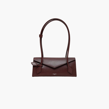 Burgundy red small Le Teckel leather East-West bag by Alaïa