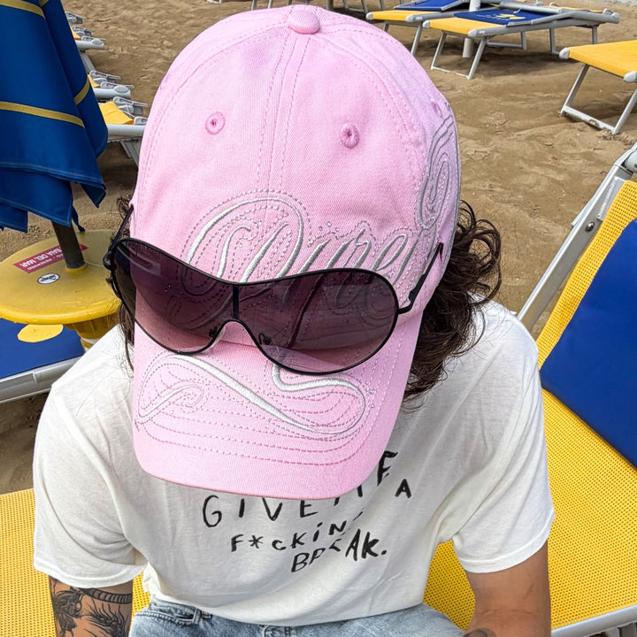Men's Fall Winter 2026 new arrivals featuring a pink KAP cap with integrated  sunglasses
