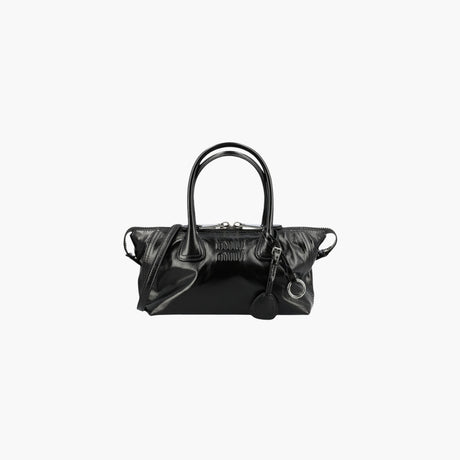 Black logo-embossed shoulder bag by Miu Miu
