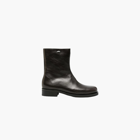 Black Camion leather biker boots by Our Legacy