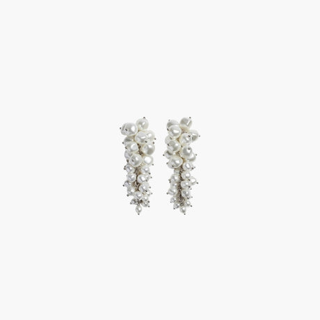 Pearl cluster drop earrings by Simone Rocha