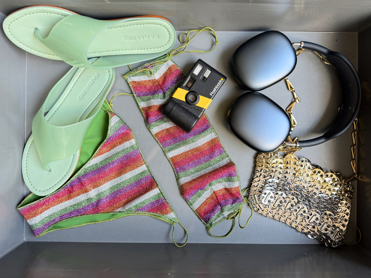 Women's designer swimwear selection featuring an Oséree lurex striped swimsuit with multicolor shades of green and pink