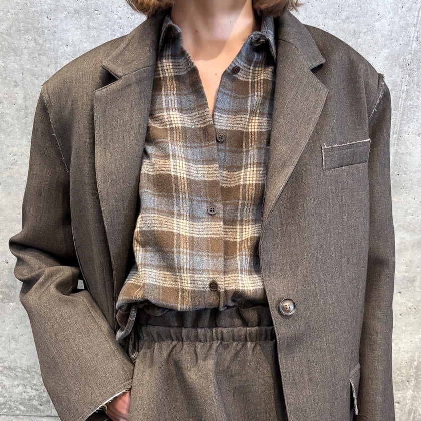 Women's Fall Winter 2026 new arrivals featuring an Eleh beige and brown checked shirt styled with a matching tailored blazer