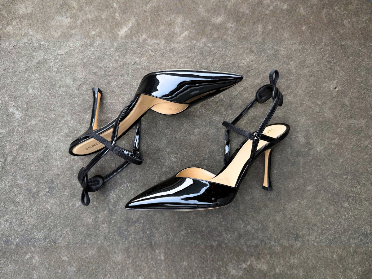 Black Fendi patent leather pump.