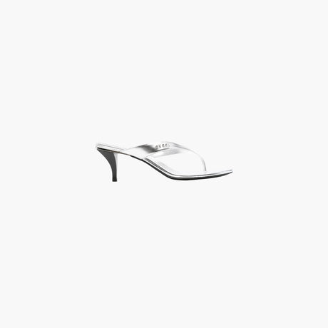 Black thong strap sandals with logo lettering by Gucci