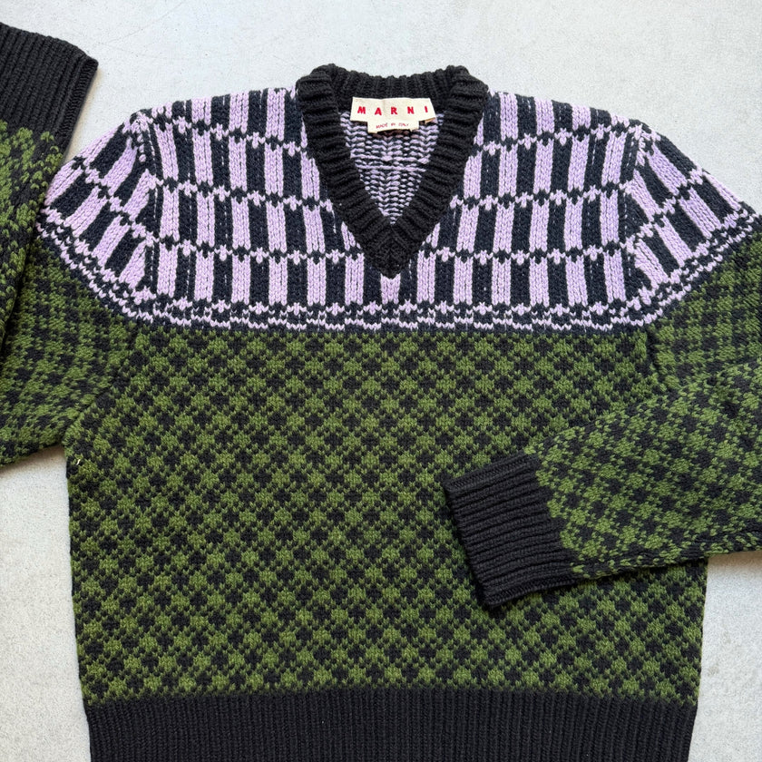 Men's New Arrivals 26 featuring a Marni V-neck sweater in carded wool with contrasting geometric motifs and a Marni patch on the back.