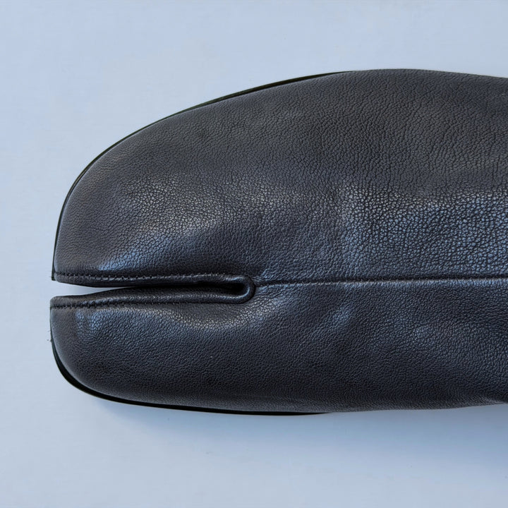Men's New Arrivals 26 featuring a black Maison Margiela Tabi shoe.