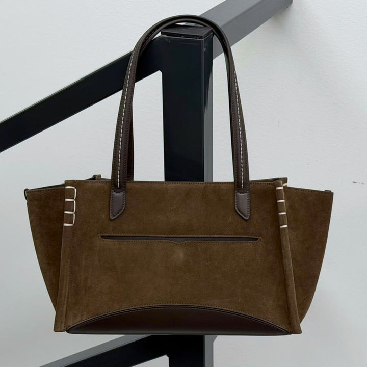 Brown suede JW Anderson bag.