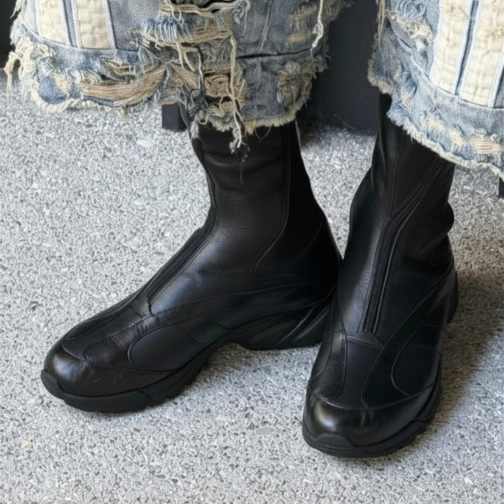 Black panelled zip boots with chunky rubber sole by Our Legacy for mens shoes selection