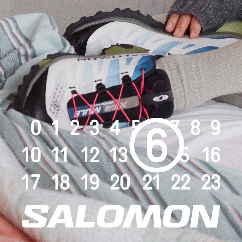 White and blue sneakers by MM6 Maison Margiela X Salomon