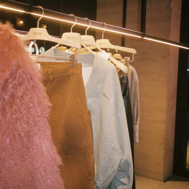 Rack of garments from The Attico new collection displayed at Eraldo Store Jesolo during the event The Attico Vista Mare 2024.